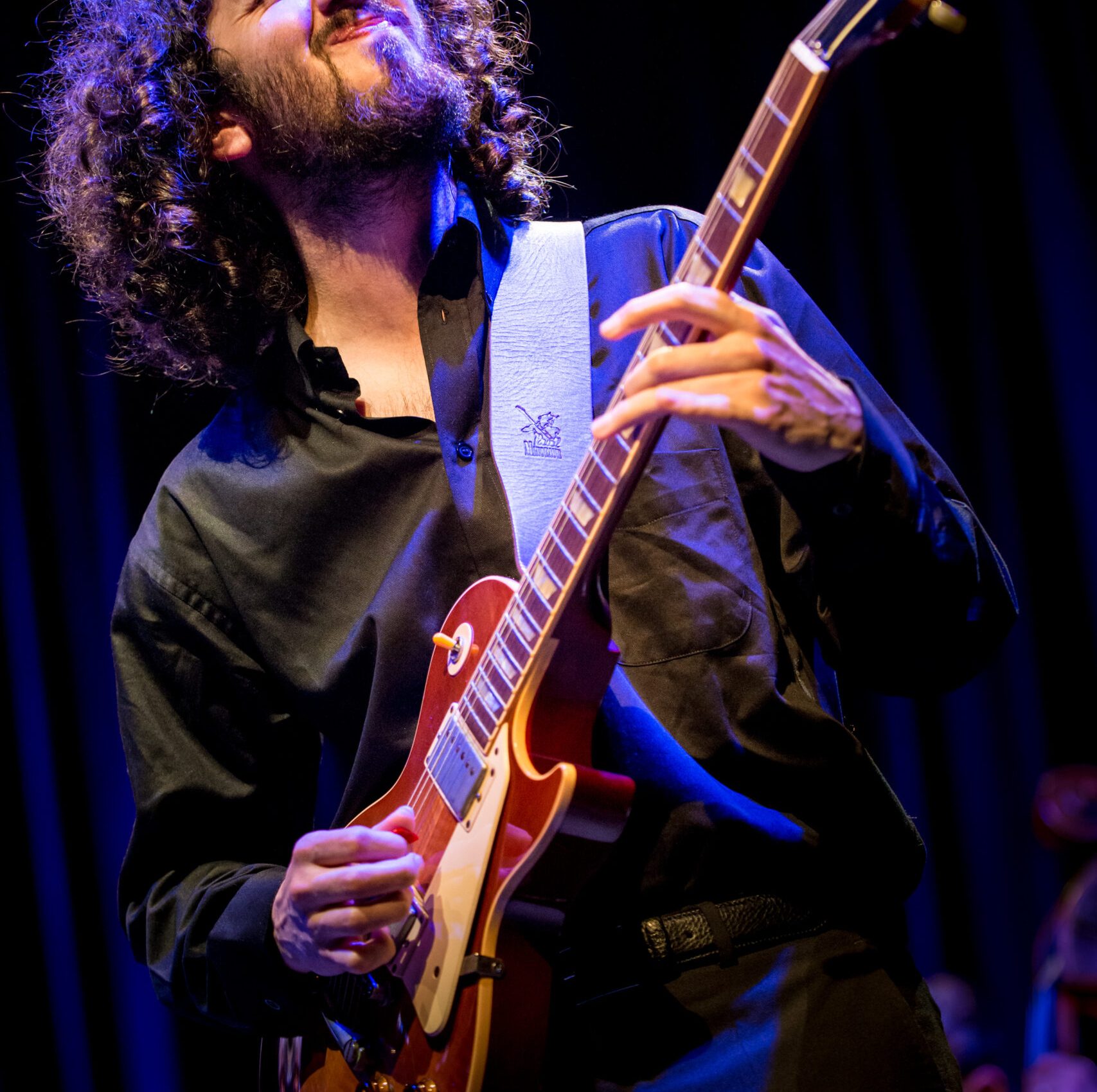 Kid Carlos on guitar